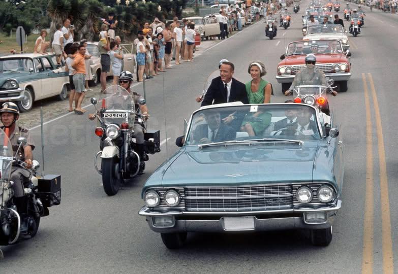 Mercury astronauts riding through cheering crowds like true celebs.